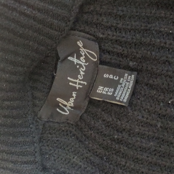 Black Off-the-Shoulder Sweater with Unique Cut-Out Neckline and Fitted Sleeves - Picture 8 of 9